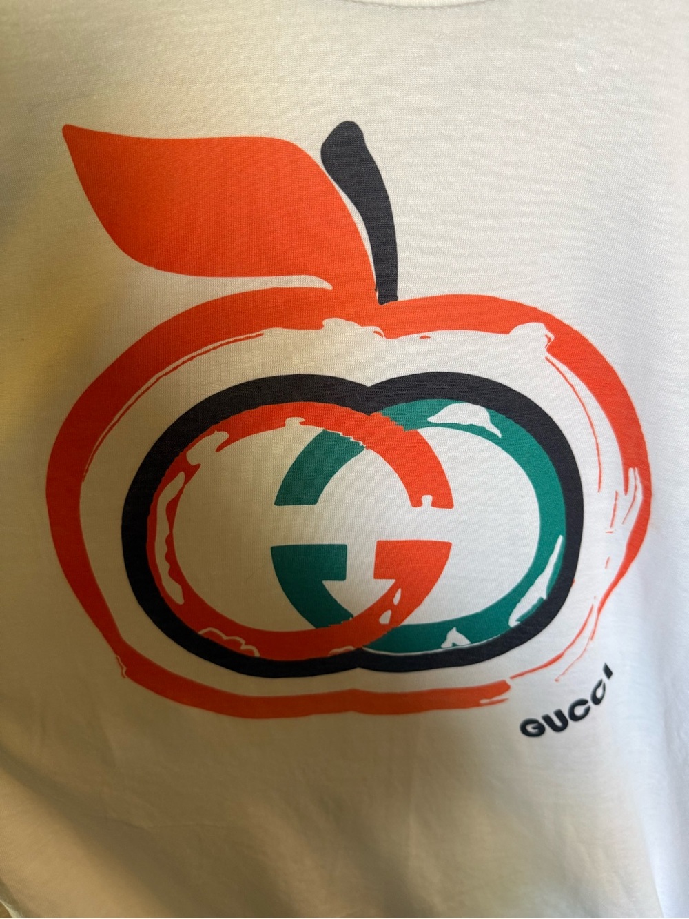 White Tee with Orange & Green Apple Logo